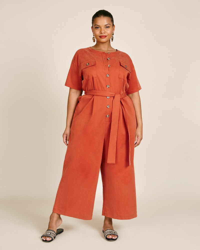 Front of a model wearing a size 12 Tia Jumpsuit in Ketchup by 11 Honoré Collection. | dia_product_style_image_id:218922